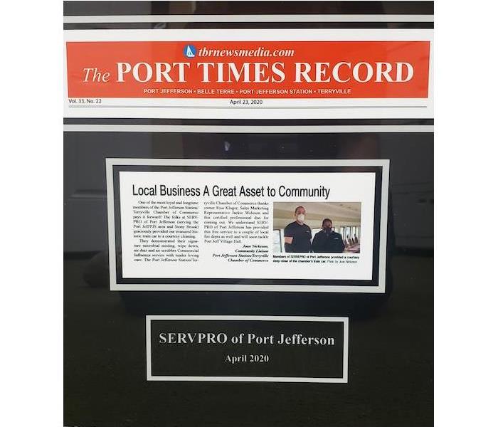 Port Times Record newspaper story cut out and on a black background