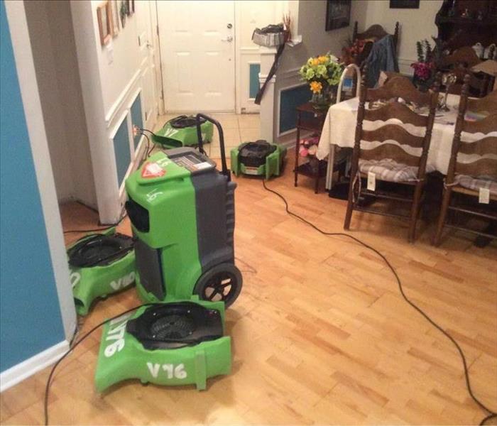 SERVPRO drying equipment in a kitchen and dining room